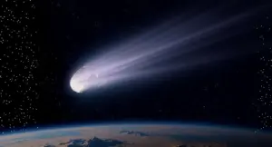 Cometa luminosa con lunga coda visibile nello spazio sopra la Terra